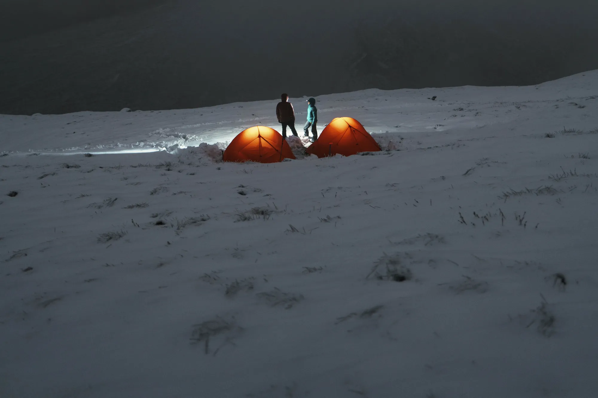 Snow camp at night